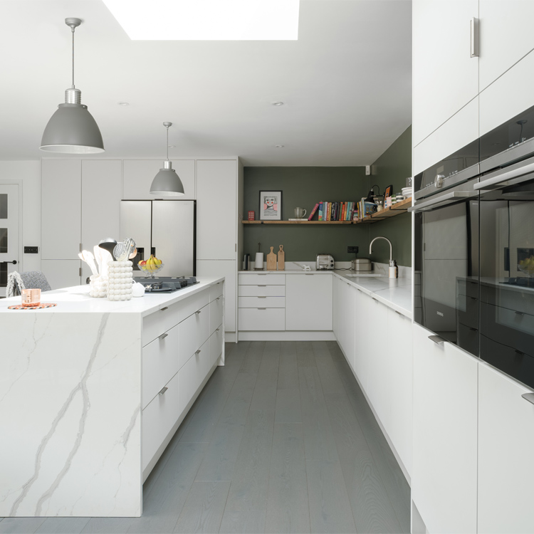 Minimalist modern kitchen in white and carrara marble