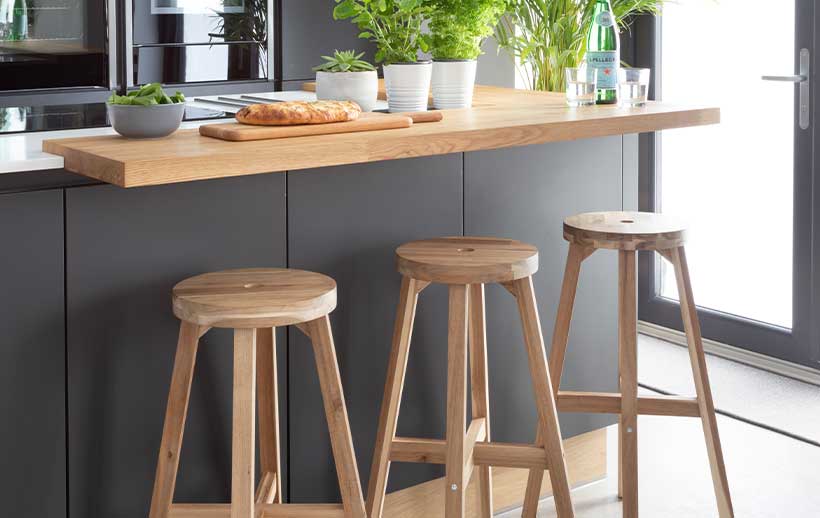 Kitchen island seating in a modern dark kitchen