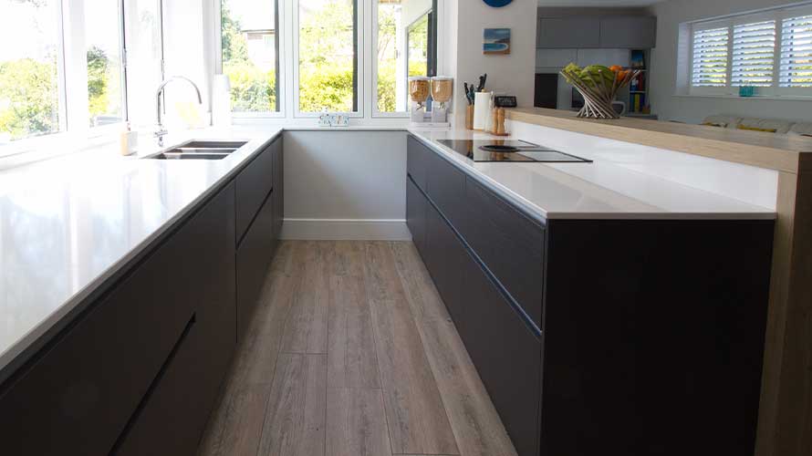 Extra wide, extra deep handleless drawers in a modern open plan kitchen