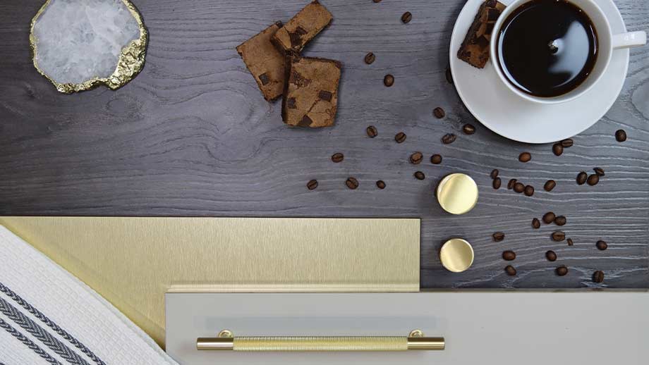 Modern wood kitchen finish with gold knurled handles