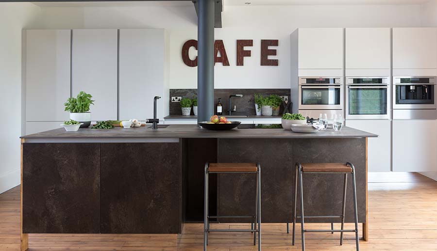 Two tone modern kitchen with grey and textured finish kitchen island