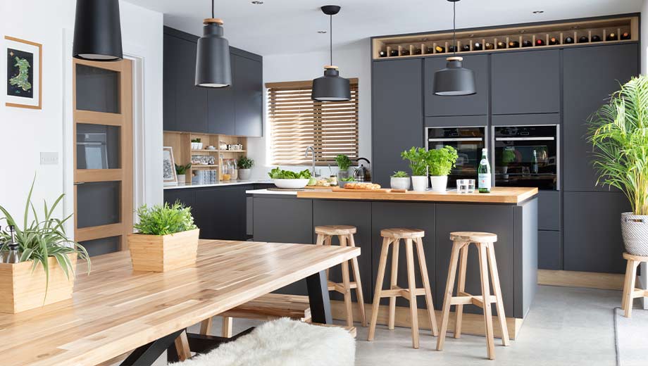 Modern kitchen with dark grey kitchen cabinets
