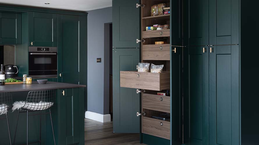 Larder unit storage in a shaker kitchen