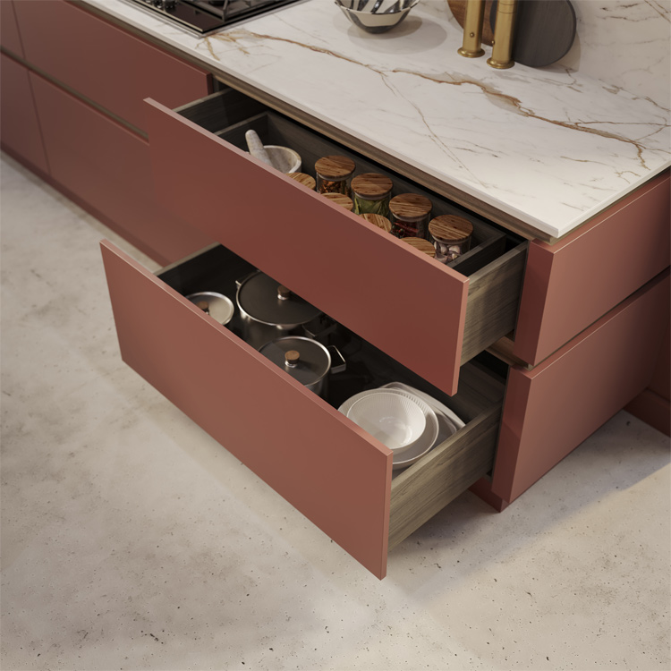 A modern red kitchen cabinet drawers