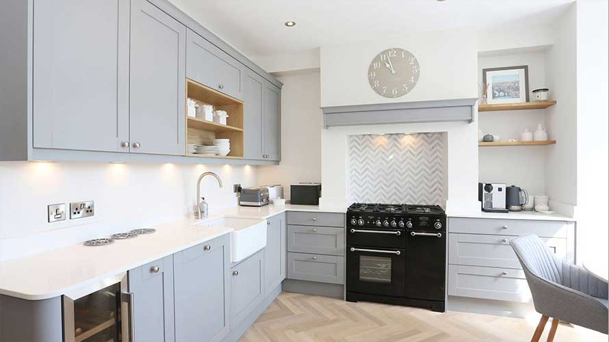 Grey shaker kitchen with mantle
