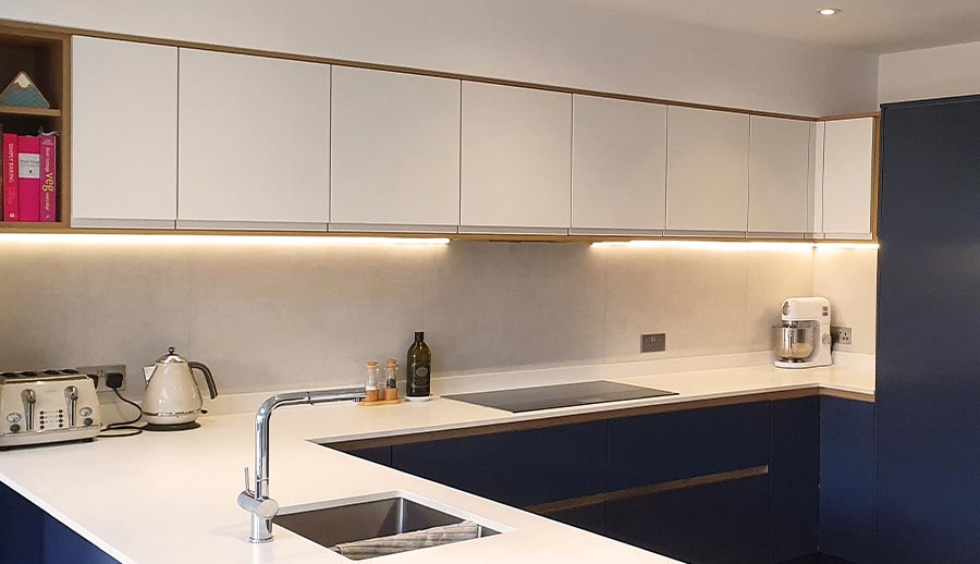 Blue and grey modern handleless kitchen