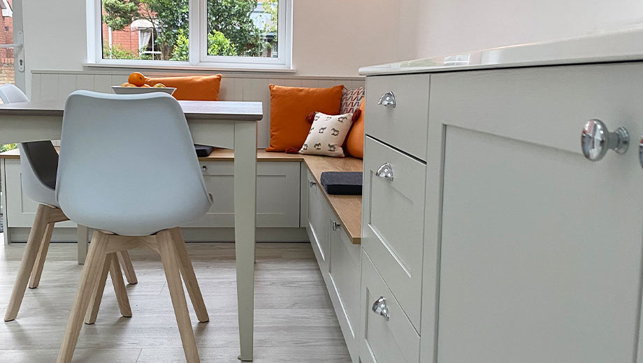 Shaker kitchen with bench seating and a kitchen table