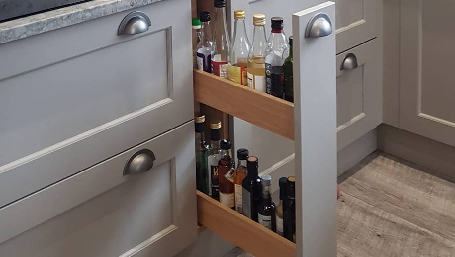 Base cabinets with small pull-out larder