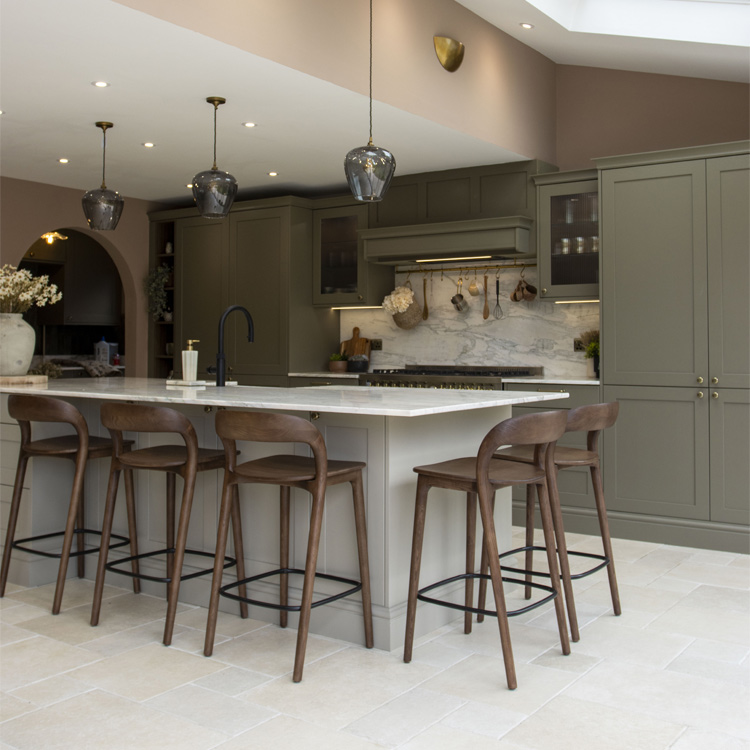 A contemporary rustic kitchen with a large island