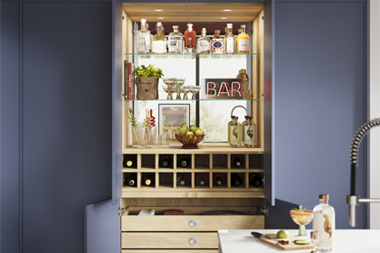 A trending handleless drinks cabinet in a modern kitchen