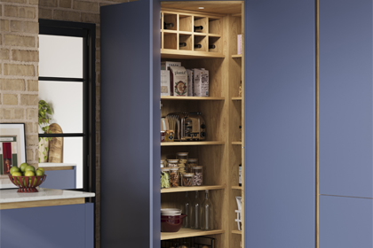 A trending handleless corner pantry in a modern kitchen